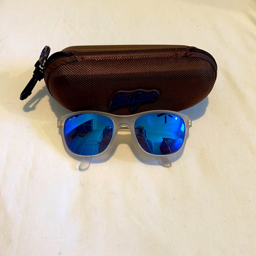 Maui Jim’s sunglasses blue mirror lens, clear frosted frame.